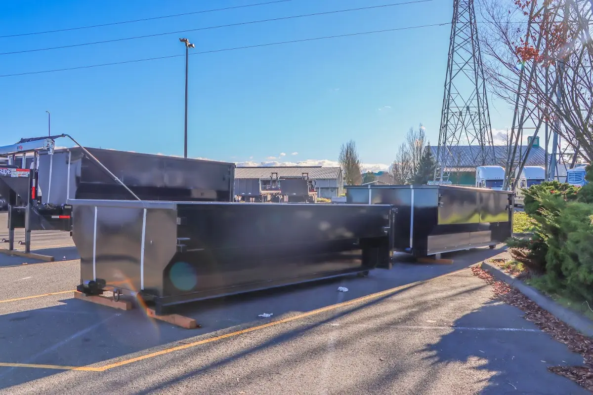 Roll-off dumpster ready for waste disposal at job site for Demolition Dumpster Rental in Telford